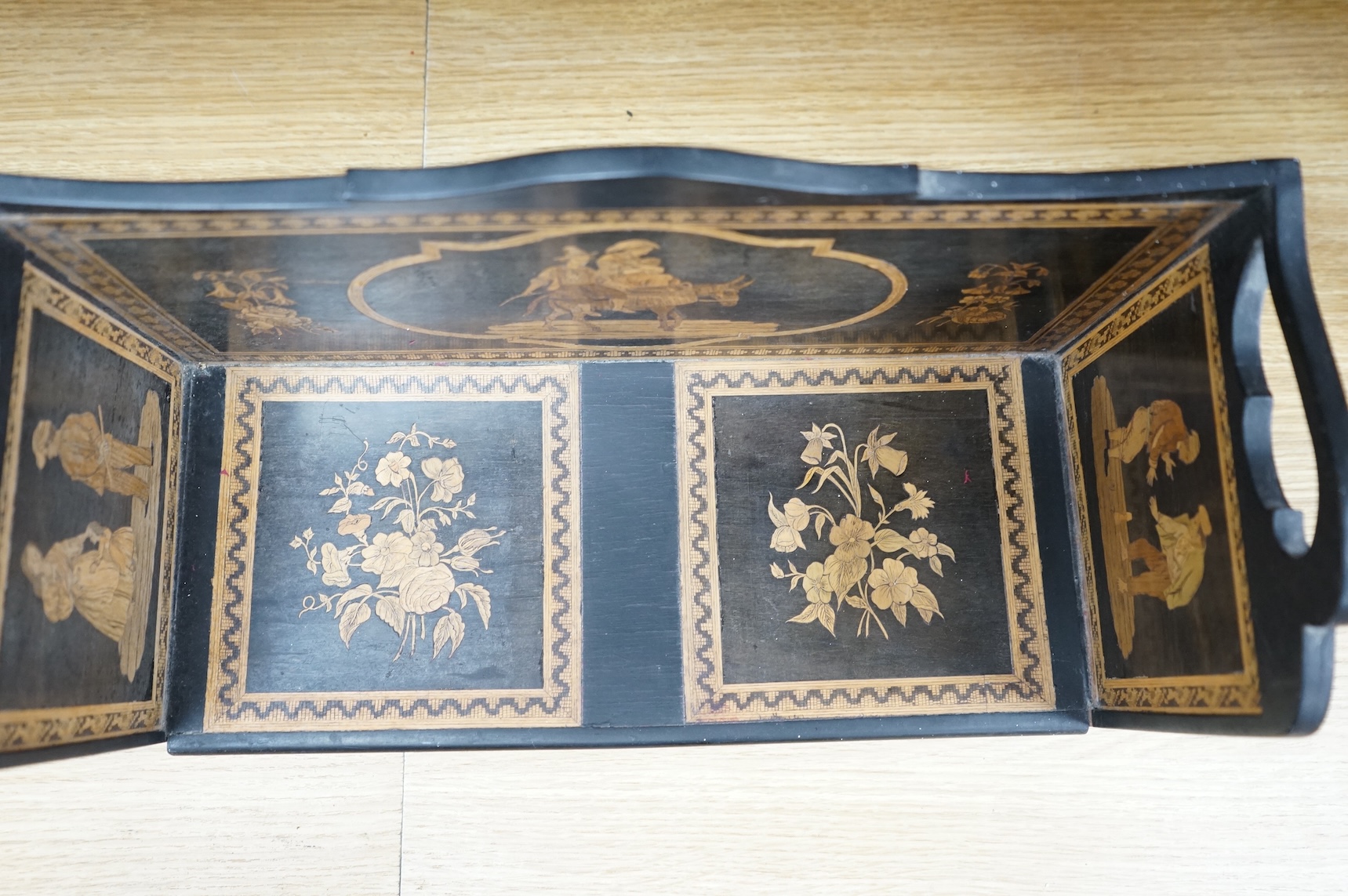 A late 19th century Sorrento ware book stand, 37.5cm wide x 20cm high